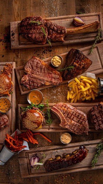 Grilled meats, burgers and fries at MEAT30 steakhouse in Schaerbeek